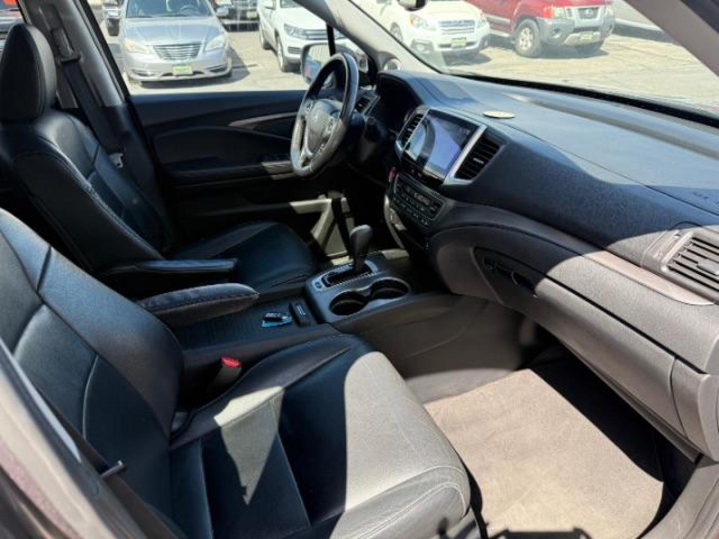 2018 GREY /Black Honda Pilot EX-L (5FNYF6H55JB) with an 3.5L V-6 gasoline direct injection engine, AUTOMATIC transmission, located at 1235 N Woodruff Ave., Idaho Falls, 83401, (208) 523-1053, 43.507172, -112.000488 - At Timberline Auto, finding a great deal on your next vehicle is always easy! Our experienced sales staff's goal is to help find you the right vehicle at the right price! Our knowledgeable finance department has options for almost any credit score. We offer extended service contract options to prote - Photo#12