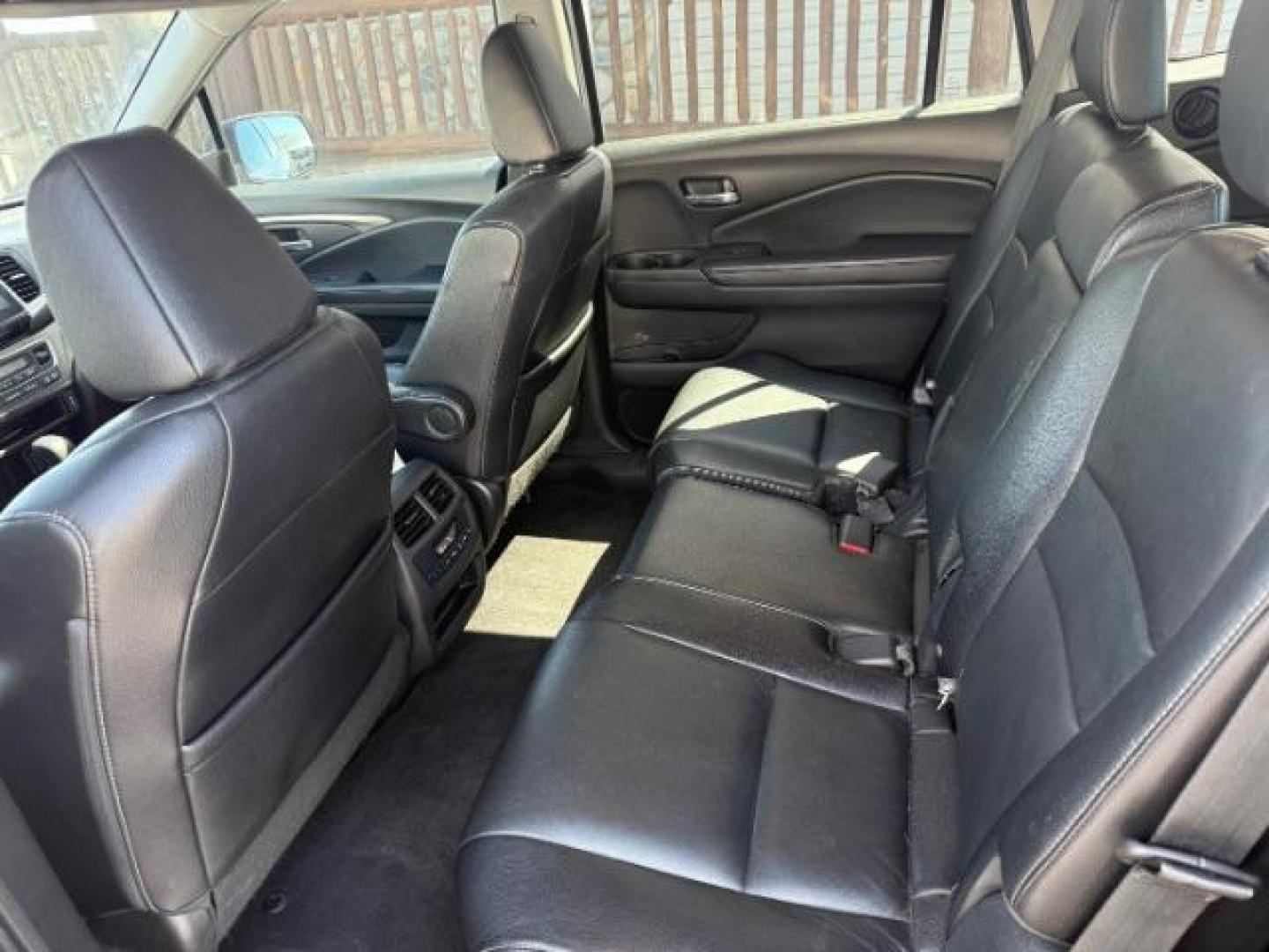 2018 GREY /Black Honda Pilot EX-L (5FNYF6H55JB) with an 3.5L V-6 gasoline direct injection engine, AUTOMATIC transmission, located at 1235 N Woodruff Ave., Idaho Falls, 83401, (208) 523-1053, 43.507172, -112.000488 - At Timberline Auto, finding a great deal on your next vehicle is always easy! Our experienced sales staff's goal is to help find you the right vehicle at the right price! Our knowledgeable finance department has options for almost any credit score. We offer extended service contract options to prote - Photo#13