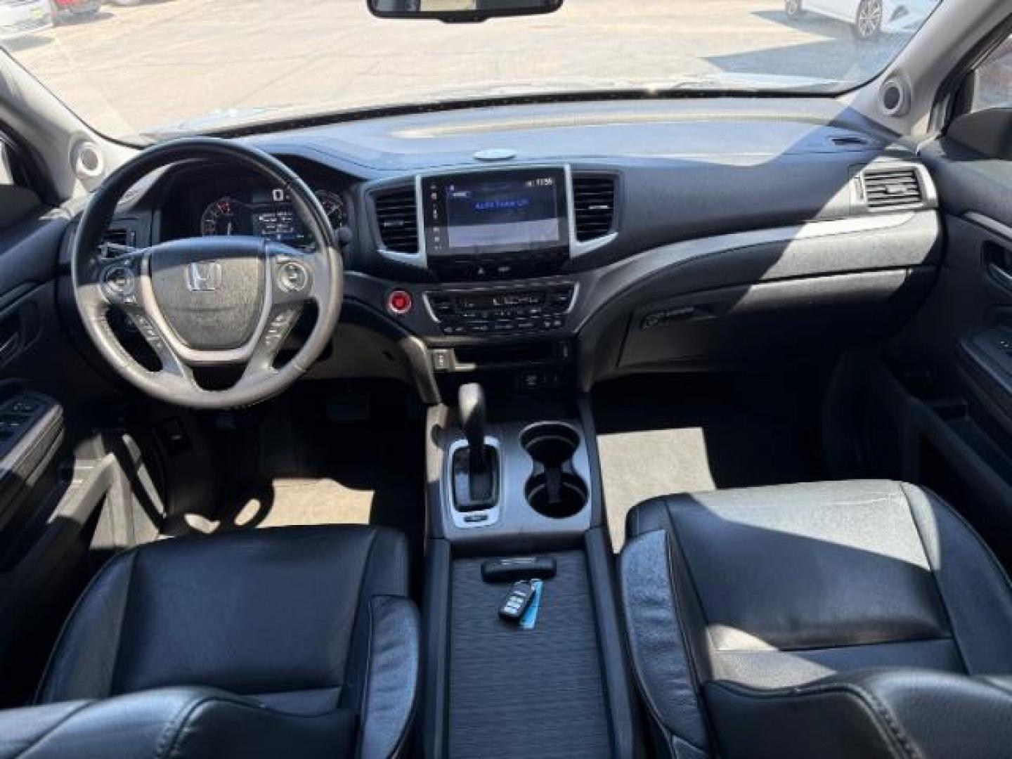 2018 GREY /Black Honda Pilot EX-L (5FNYF6H55JB) with an 3.5L V-6 gasoline direct injection engine, AUTOMATIC transmission, located at 1235 N Woodruff Ave., Idaho Falls, 83401, (208) 523-1053, 43.507172, -112.000488 - At Timberline Auto, finding a great deal on your next vehicle is always easy! Our experienced sales staff's goal is to help find you the right vehicle at the right price! Our knowledgeable finance department has options for almost any credit score. We offer extended service contract options to prote - Photo#16