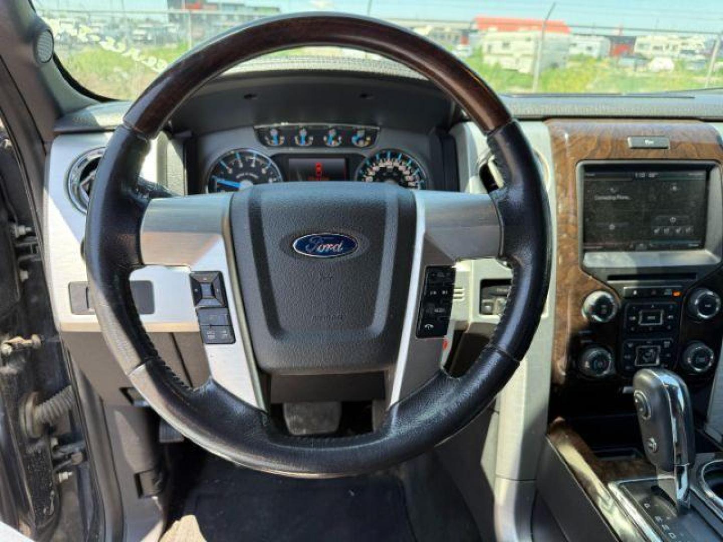 2014 BLACK /LEATHER FORD F150 PLATINUM (1FTFW1ETDEF) with an 3.5 engine, AUTOMATIC transmission, located at 1235 N Woodruff Ave., Idaho Falls, 83401, (208) 523-1053, 43.507172, -112.000488 - At Timberline Auto, finding a great deal on your next vehicle is always easy! Our experienced sales staff's goal is to help find you the right vehicle at the right price! Our knowledgeable finance department has options for almost any credit score. We offer extended service contract options to prote - Photo#34
