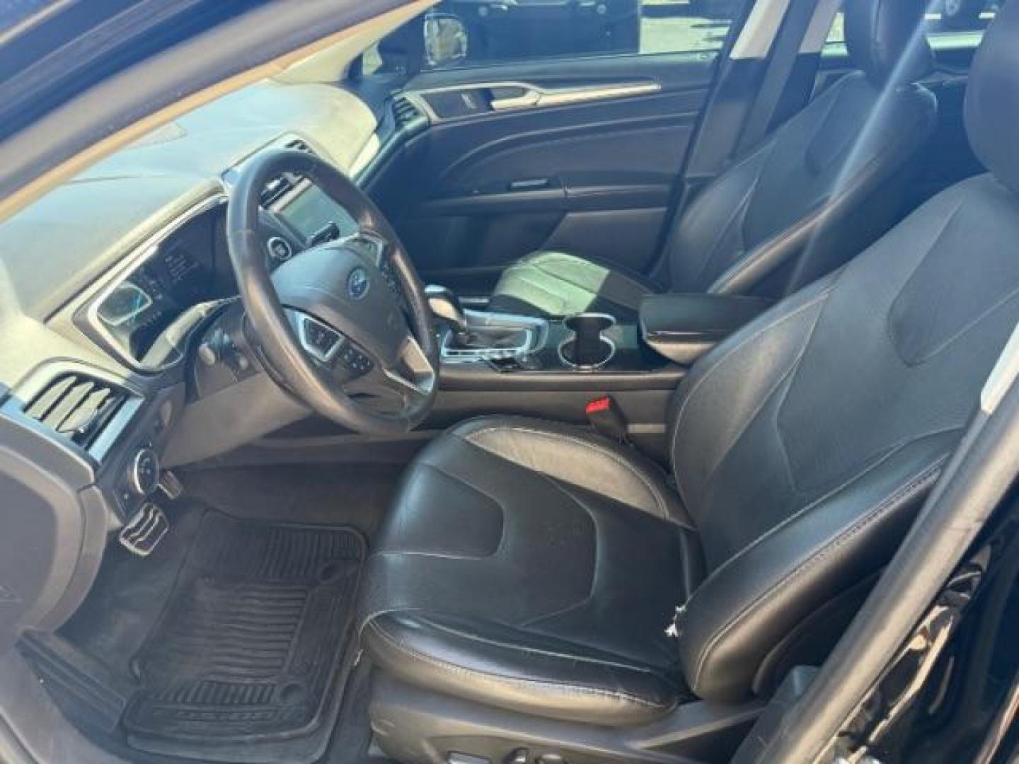 2016 Shadow Black /Charcoal Black Ford Fusion Titanium (3FA6P0K9XGR) with an EcoBoost 2L I-4 gasoline direct injection engine, AUTOMATIC transmission, located at 1235 N Woodruff Ave., Idaho Falls, 83401, (208) 523-1053, 43.507172, -112.000488 - Photo#7