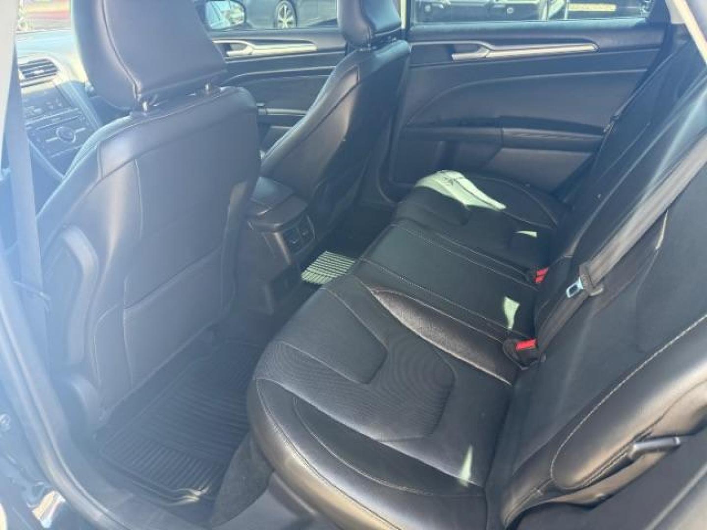 2016 Shadow Black /Charcoal Black Ford Fusion Titanium (3FA6P0K9XGR) with an EcoBoost 2L I-4 gasoline direct injection engine, AUTOMATIC transmission, located at 1235 N Woodruff Ave., Idaho Falls, 83401, (208) 523-1053, 43.507172, -112.000488 - Photo#10