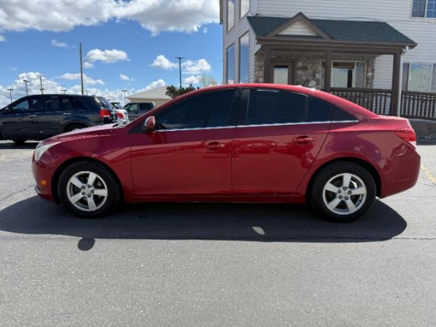 2011 Crystal Red Metallic Tintcoat /Jet Black Chevrolet Cruze 1LT (1G1PF5S9XB7) with an Ecotec 1.4L I-4 DOHC engine, AUTOMATIC transmission, located at 1235 N Woodruff Ave., Idaho Falls, 83401, (208) 523-1053, 43.507172, -112.000488 - Photo#1
