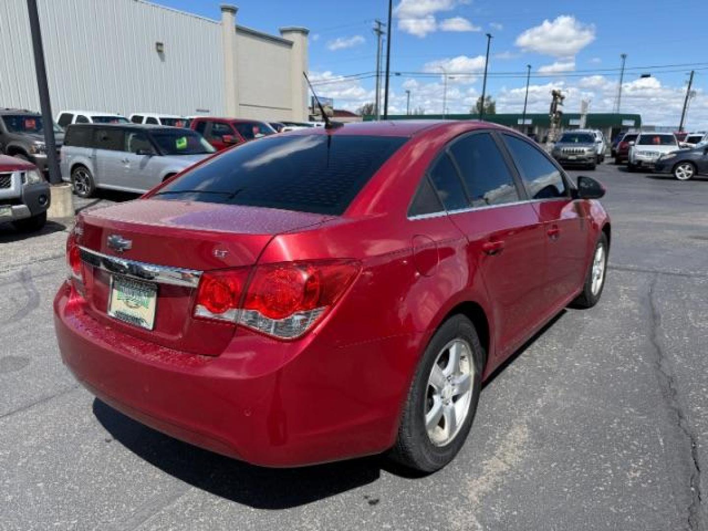 2011 Crystal Red Metallic Tintcoat /Jet Black Chevrolet Cruze 1LT (1G1PF5S9XB7) with an Ecotec 1.4L I-4 DOHC engine, AUTOMATIC transmission, located at 1235 N Woodruff Ave., Idaho Falls, 83401, (208) 523-1053, 43.507172, -112.000488 - Photo#4