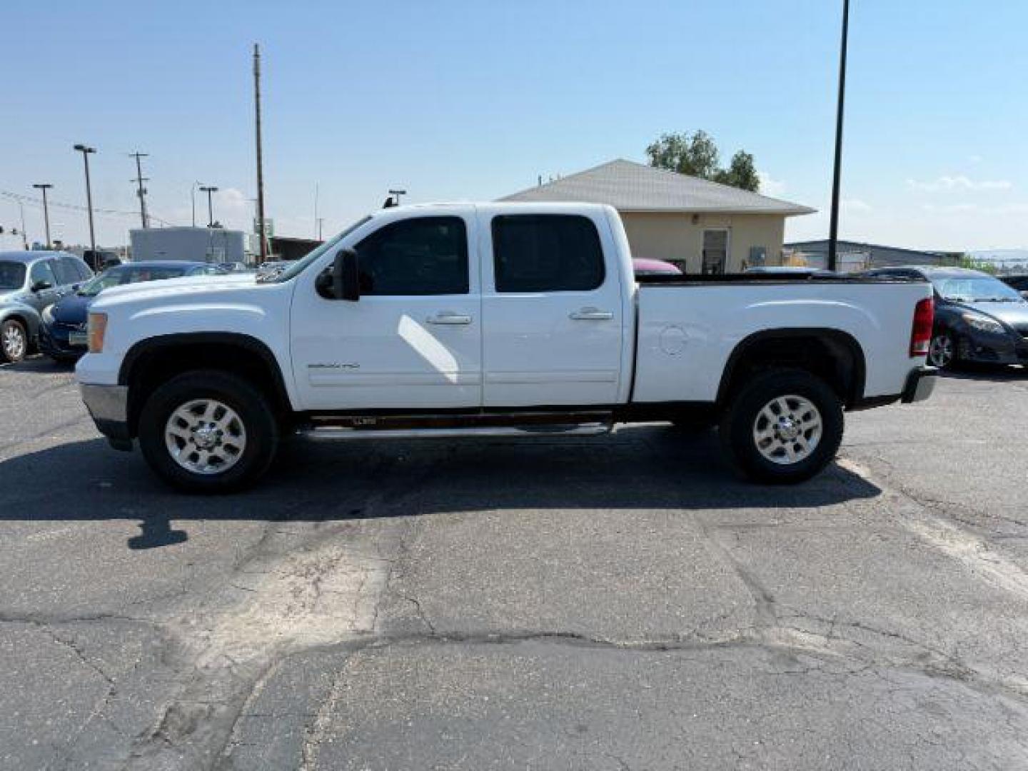 2012 Summit White /Ebony GMC Sierra 2500HD (1GT121E81CF) with an Duramax 66L V-8 diesel direct injection engine, Automatic transmission, located at 1175 N Woodruff Ave, Idaho Falls, ID, 83401, 43.506901, -111.999657 - At Timberline Auto, finding a great deal on your next vehicle is always easy! Our experienced sales staff's goal is to help find you the right vehicle at the right price! Our knowledgeable finance department has options for almost any credit score. We offer extended service contract options to prote - Photo#22