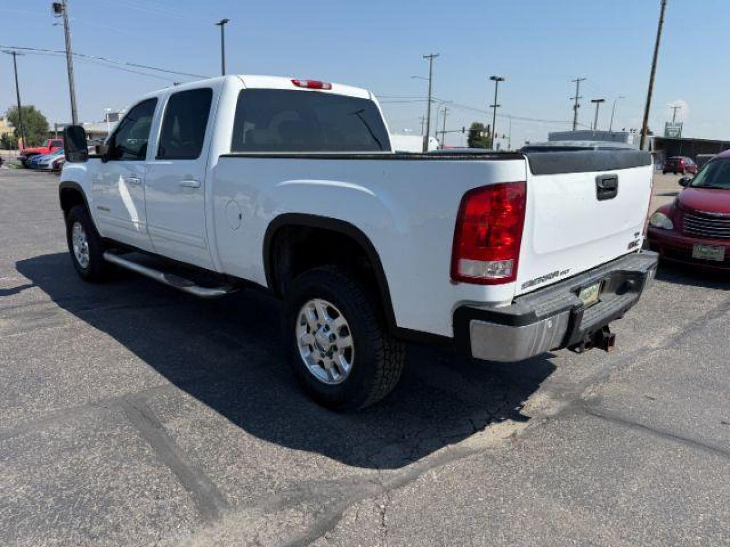 2012 Summit White /Ebony GMC Sierra 2500HD (1GT121E81CF) with an Duramax 66L V-8 diesel direct injection engine, Automatic transmission, located at 1175 N Woodruff Ave, Idaho Falls, ID, 83401, 43.506901, -111.999657 - At Timberline Auto, finding a great deal on your next vehicle is always easy! Our experienced sales staff's goal is to help find you the right vehicle at the right price! Our knowledgeable finance department has options for almost any credit score. We offer extended service contract options to prote - Photo#23