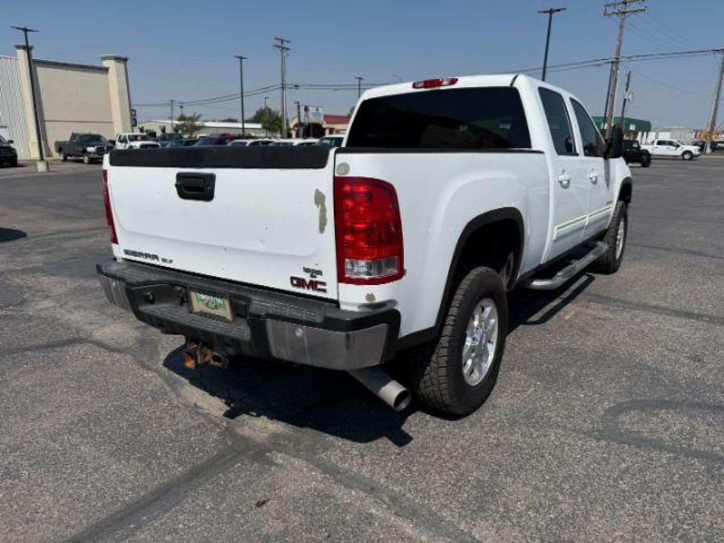 2012 Summit White /Ebony GMC Sierra 2500HD (1GT121E81CF) with an Duramax 66L V-8 diesel direct injection engine, Automatic transmission, located at 1175 N Woodruff Ave, Idaho Falls, ID, 83401, 43.506901, -111.999657 - At Timberline Auto, finding a great deal on your next vehicle is always easy! Our experienced sales staff's goal is to help find you the right vehicle at the right price! Our knowledgeable finance department has options for almost any credit score. We offer extended service contract options to prote - Photo#26