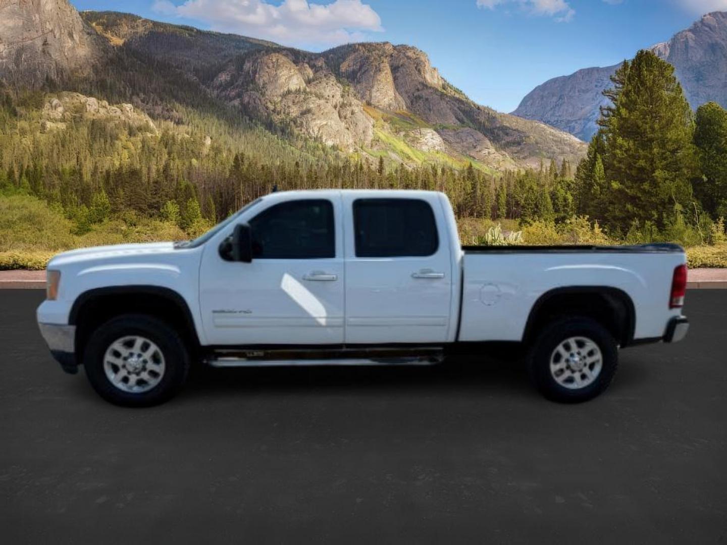 2012 Summit White /Ebony GMC Sierra 2500HD (1GT121E81CF) with an Duramax 66L V-8 diesel direct injection engine, Automatic transmission, located at 1175 N Woodruff Ave, Idaho Falls, ID, 83401, 43.506901, -111.999657 - At Timberline Auto, finding a great deal on your next vehicle is always easy! Our experienced sales staff's goal is to help find you the right vehicle at the right price! Our knowledgeable finance department has options for almost any credit score. We offer extended service contract options to prote - Photo#1