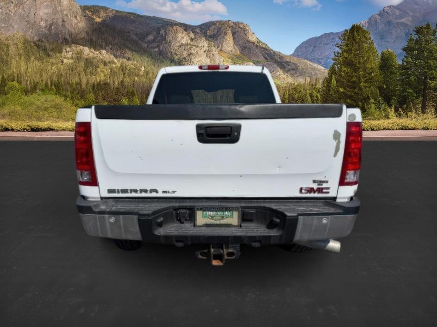 2012 Summit White /Ebony GMC Sierra 2500HD (1GT121E81CF) with an Duramax 66L V-8 diesel direct injection engine, Automatic transmission, located at 1175 N Woodruff Ave, Idaho Falls, ID, 83401, 43.506901, -111.999657 - At Timberline Auto, finding a great deal on your next vehicle is always easy! Our experienced sales staff's goal is to help find you the right vehicle at the right price! Our knowledgeable finance department has options for almost any credit score. We offer extended service contract options to prote - Photo#3