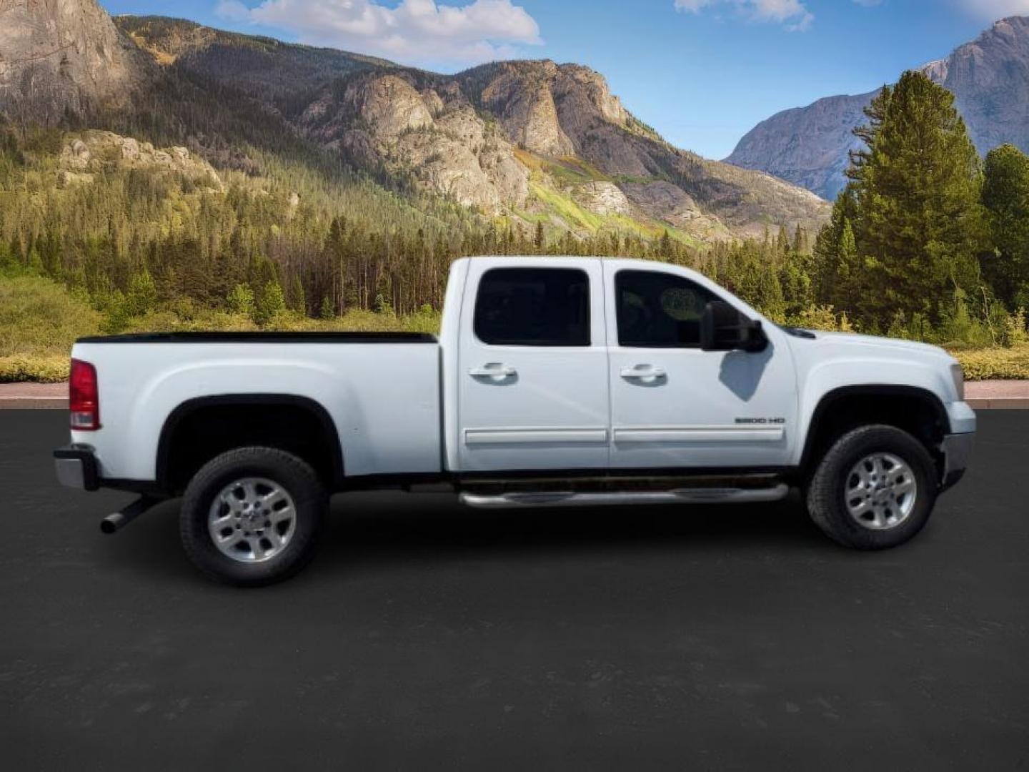 2012 Summit White /Ebony GMC Sierra 2500HD (1GT121E81CF) with an Duramax 66L V-8 diesel direct injection engine, Automatic transmission, located at 1175 N Woodruff Ave, Idaho Falls, ID, 83401, 43.506901, -111.999657 - At Timberline Auto, finding a great deal on your next vehicle is always easy! Our experienced sales staff's goal is to help find you the right vehicle at the right price! Our knowledgeable finance department has options for almost any credit score. We offer extended service contract options to prote - Photo#6