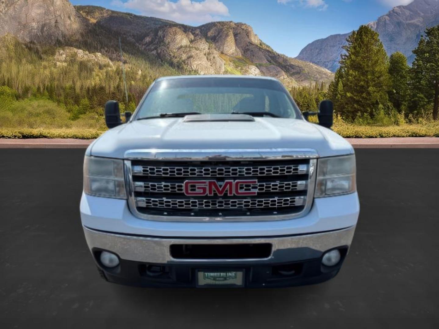 2012 Summit White /Ebony GMC Sierra 2500HD (1GT121E81CF) with an Duramax 66L V-8 diesel direct injection engine, Automatic transmission, located at 1175 N Woodruff Ave, Idaho Falls, ID, 83401, 43.506901, -111.999657 - At Timberline Auto, finding a great deal on your next vehicle is always easy! Our experienced sales staff's goal is to help find you the right vehicle at the right price! Our knowledgeable finance department has options for almost any credit score. We offer extended service contract options to prote - Photo#8