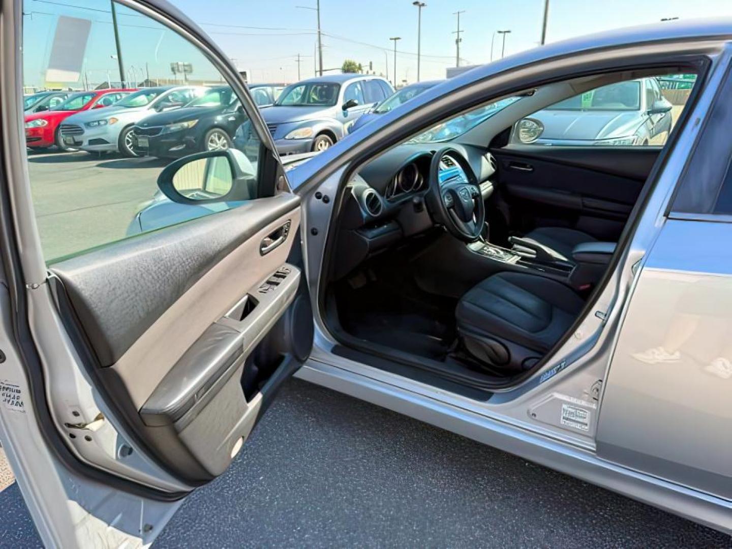 2013 Ingot Silver /Black Mazda Mazda6 (1YVHZ8BH6D5) with an 25L I-4 DOHC engine, Automatic transmission, located at 1175 N Woodruff Ave, Idaho Falls, ID, 83401, 43.506901, -111.999657 - At Timberline Auto, finding a great deal on your next vehicle is always easy! Our experienced sales staff's goal is to help find you the right vehicle at the right price! Our knowledgeable finance department has options for almost any credit score. We offer extended service contract options to prote - Photo#9