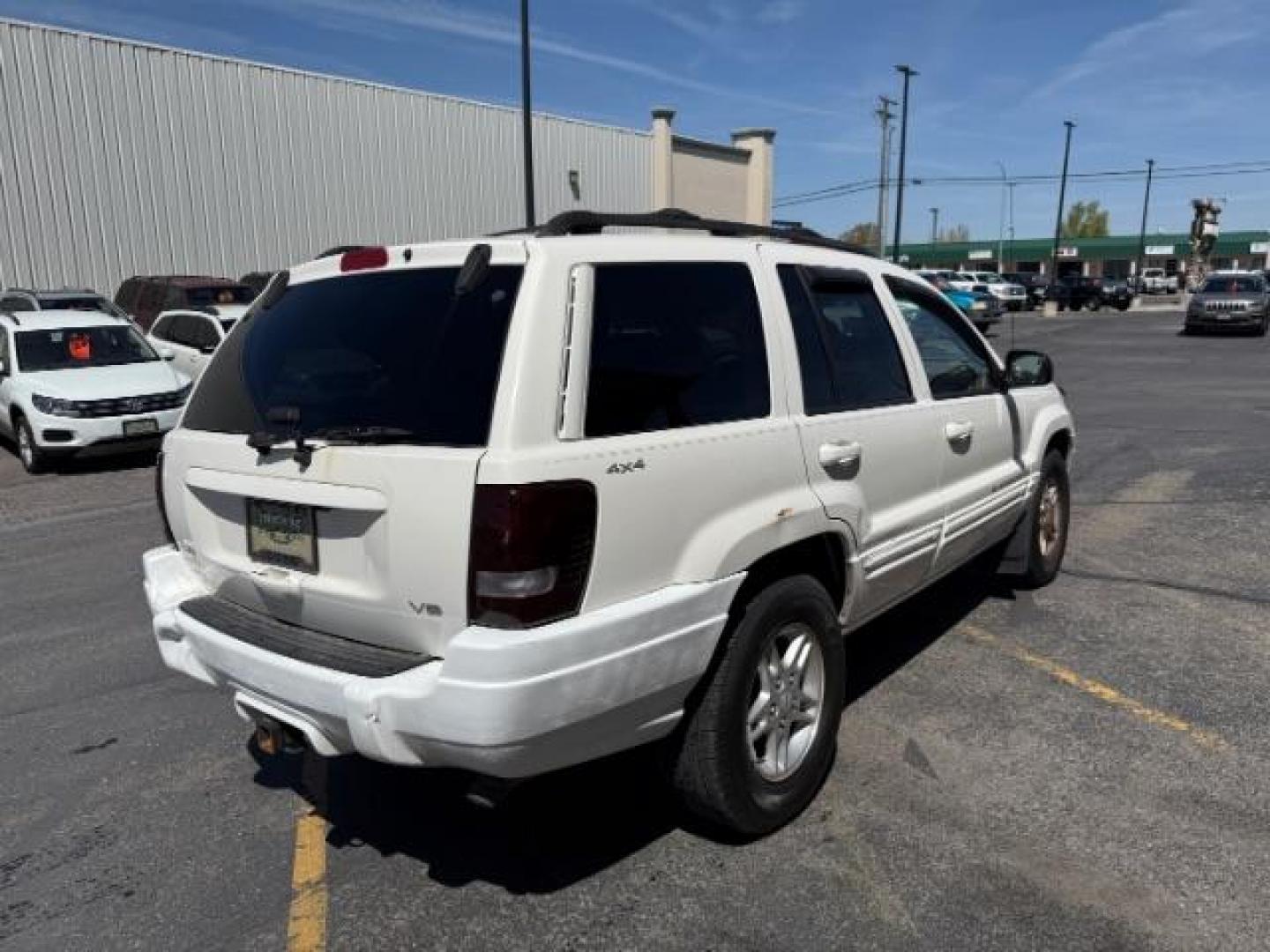 2000 Stone White Clearcoat /Camel Leather Jeep Grand Cherokee (1J4GW58N5YC) with an 47L V8 SOHC 16V engine, Automatic transmission, located at 1175 N Woodruff Ave, Idaho Falls, ID, 83401, 43.506901, -111.999657 - At Timberline Auto, finding a great deal on your next vehicle is always easy! Our experienced sales staff's goal is to help find you the right vehicle at the right price! Our knowledgeable finance department has options for almost any credit score. We offer extended service contract options to prote - Photo#19