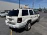 2000 Stone White Clearcoat /Camel Leather Jeep Grand Cherokee (1J4GW58N5YC) with an 47L V8 SOHC 16V engine, Automatic transmission, located at 1175 N Woodruff Ave, Idaho Falls, ID, 83401, 43.506901, -111.999657 - At Timberline Auto, finding a great deal on your next vehicle is always easy! Our experienced sales staff's goal is to help find you the right vehicle at the right price! Our knowledgeable finance department has options for almost any credit score. We offer extended service contract options to prote - Photo#19