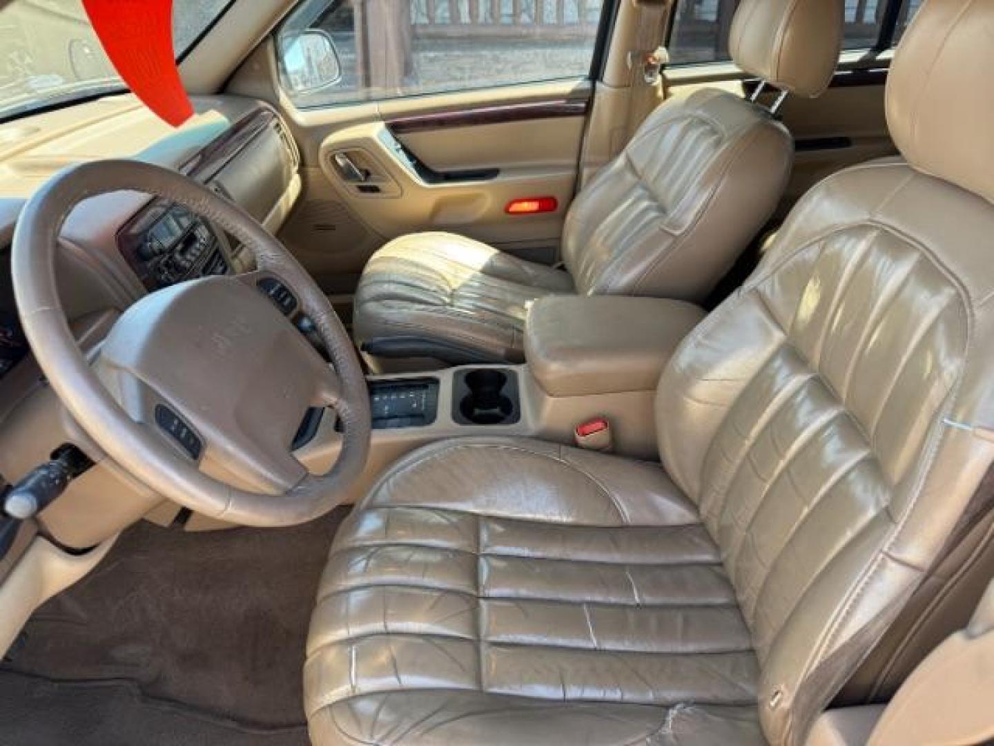2000 Stone White Clearcoat /Camel Leather Jeep Grand Cherokee (1J4GW58N5YC) with an 47L V8 SOHC 16V engine, Automatic transmission, located at 1175 N Woodruff Ave, Idaho Falls, ID, 83401, 43.506901, -111.999657 - At Timberline Auto, finding a great deal on your next vehicle is always easy! Our experienced sales staff's goal is to help find you the right vehicle at the right price! Our knowledgeable finance department has options for almost any credit score. We offer extended service contract options to prote - Photo#22