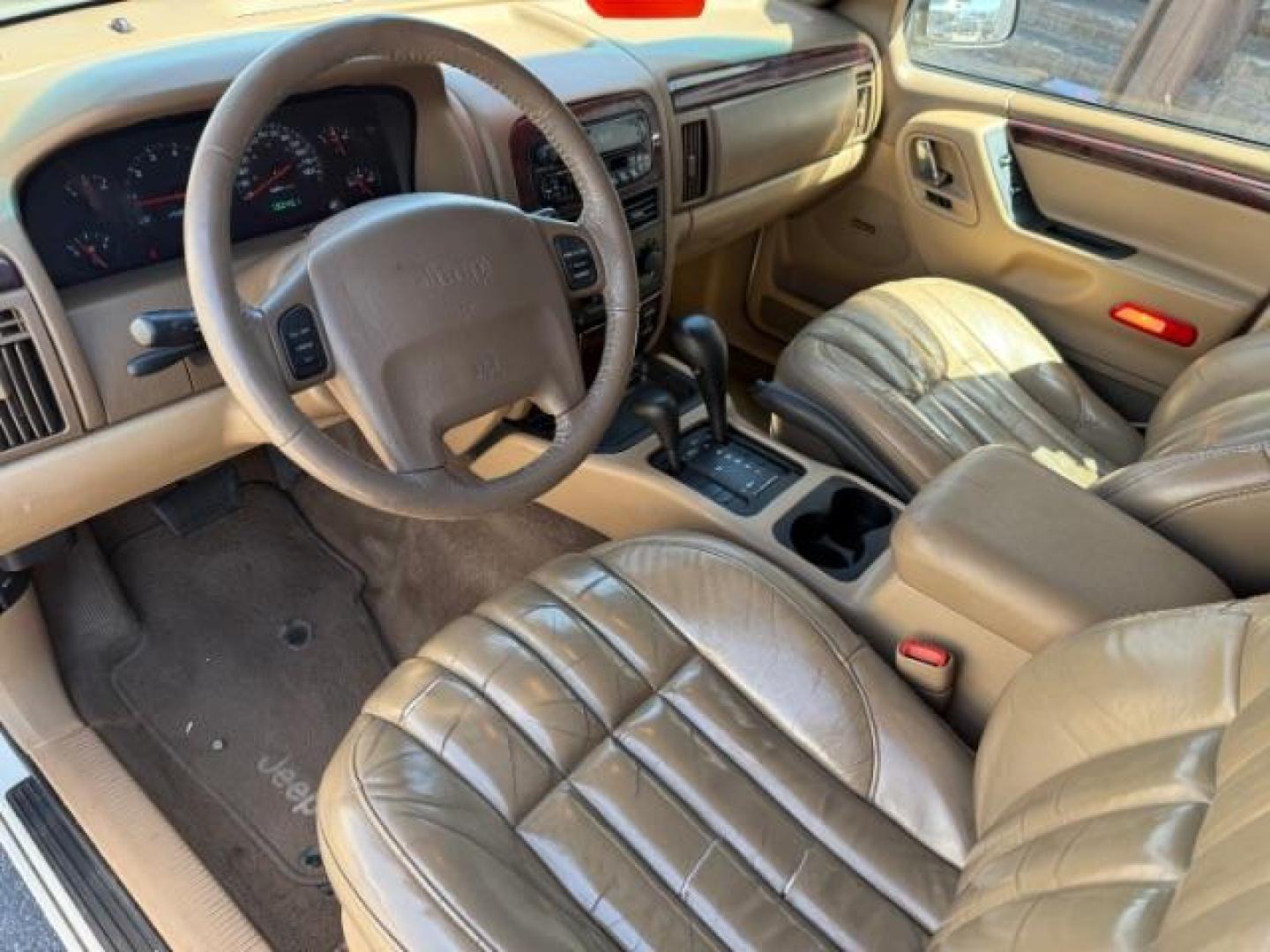 2000 Stone White Clearcoat /Camel Leather Jeep Grand Cherokee (1J4GW58N5YC) with an 47L V8 SOHC 16V engine, Automatic transmission, located at 1175 N Woodruff Ave, Idaho Falls, ID, 83401, 43.506901, -111.999657 - At Timberline Auto, finding a great deal on your next vehicle is always easy! Our experienced sales staff's goal is to help find you the right vehicle at the right price! Our knowledgeable finance department has options for almost any credit score. We offer extended service contract options to prote - Photo#23