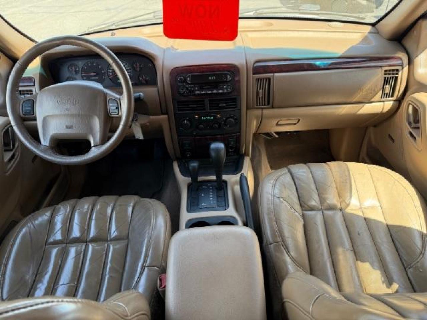 2000 Stone White Clearcoat /Camel Leather Jeep Grand Cherokee (1J4GW58N5YC) with an 47L V8 SOHC 16V engine, Automatic transmission, located at 1175 N Woodruff Ave, Idaho Falls, ID, 83401, 43.506901, -111.999657 - At Timberline Auto, finding a great deal on your next vehicle is always easy! Our experienced sales staff's goal is to help find you the right vehicle at the right price! Our knowledgeable finance department has options for almost any credit score. We offer extended service contract options to prote - Photo#26