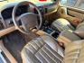 2000 Stone White Clearcoat /Camel Leather Jeep Grand Cherokee (1J4GW58N5YC) with an 47L V8 SOHC 16V engine, Automatic transmission, located at 1175 N Woodruff Ave, Idaho Falls, ID, 83401, 43.506901, -111.999657 - At Timberline Auto, finding a great deal on your next vehicle is always easy! Our experienced sales staff's goal is to help find you the right vehicle at the right price! Our knowledgeable finance department has options for almost any credit score. We offer extended service contract options to prote - Photo#8