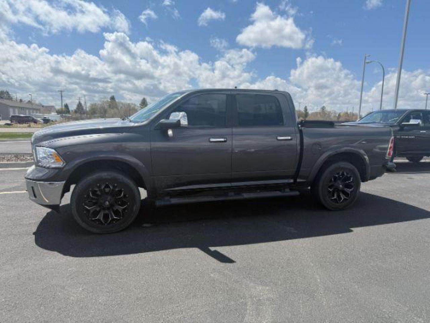 2014 GRAY /LEATHER RAM 1500 LARAMIE (1C6RR7NT4ES) with an 5.7 engine, AUTOMATIC transmission, located at 1235 N Woodruff Ave., Idaho Falls, 83401, (208) 523-1053, 43.507172, -112.000488 - At Timberline Auto, finding a great deal on your next vehicle is always easy! Our experienced sales staff's goal is to help find you the right vehicle at the right price! Our knowledgeable finance department has options for almost any credit score. We offer extended service contract options to prote - Photo#0