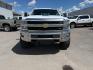 2015 Summit White /Cocoa/Dune Chevrolet Silverado 2500HD LTZ (1GC1KWE82FF) with an 6.6 engine, AUTOMATIC transmission, located at 1235 N Woodruff Ave., Idaho Falls, 83401, (208) 523-1053, 43.507172, -112.000488 - At Timberline Auto, finding a great deal on your next vehicle is always easy! Our experienced sales staff's goal is to help find you the right vehicle at the right price! Our knowledgeable finance department has options for almost any credit score. We offer extended service contract options to prote - Photo#6