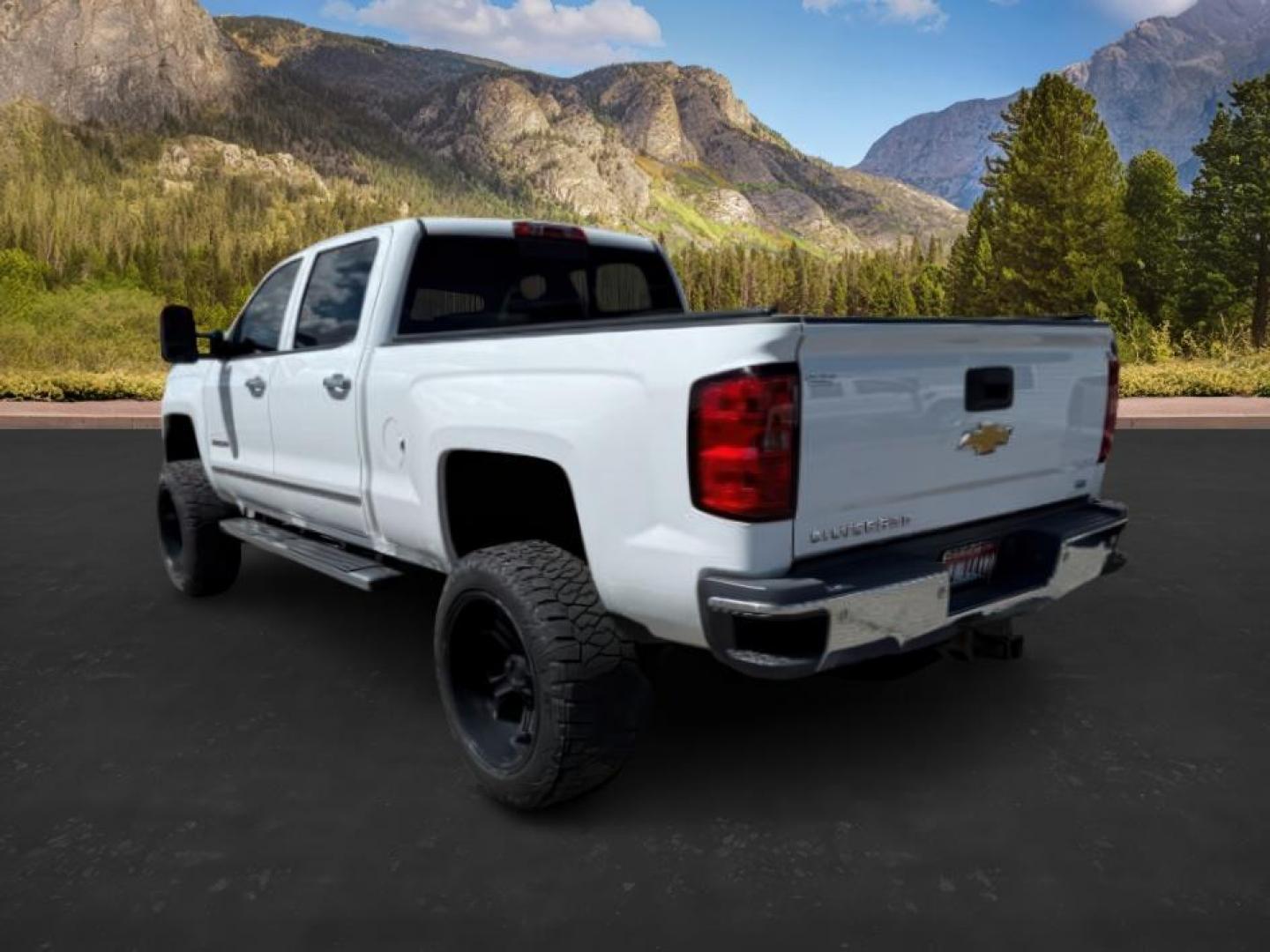 2015 Summit White /Cocoa/Dune Chevrolet Silverado 2500HD LTZ (1GC1KWE82FF) with an 6.6 engine, AUTOMATIC transmission, located at 1235 N Woodruff Ave., Idaho Falls, 83401, (208) 523-1053, 43.507172, -112.000488 - At Timberline Auto, finding a great deal on your next vehicle is always easy! Our experienced sales staff's goal is to help find you the right vehicle at the right price! Our knowledgeable finance department has options for almost any credit score. We offer extended service contract options to prote - Photo#2