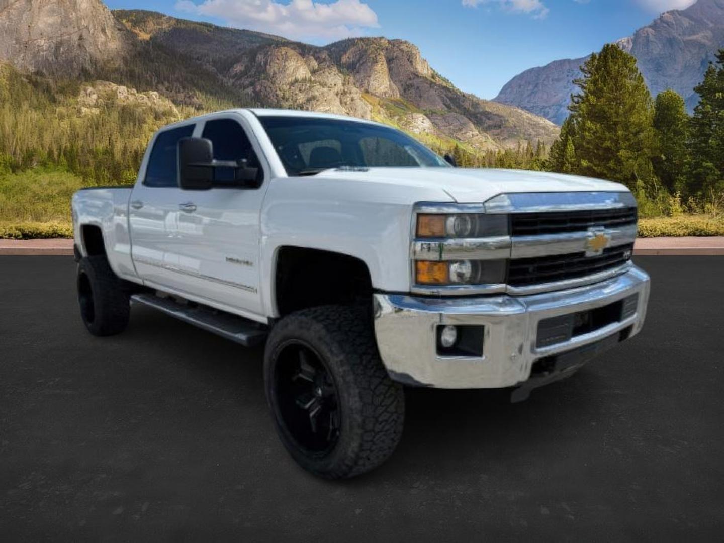 2015 Summit White /Cocoa/Dune Chevrolet Silverado 2500HD LTZ (1GC1KWE82FF) with an 6.6 engine, AUTOMATIC transmission, located at 1235 N Woodruff Ave., Idaho Falls, 83401, (208) 523-1053, 43.507172, -112.000488 - At Timberline Auto, finding a great deal on your next vehicle is always easy! Our experienced sales staff's goal is to help find you the right vehicle at the right price! Our knowledgeable finance department has options for almost any credit score. We offer extended service contract options to prote - Photo#5