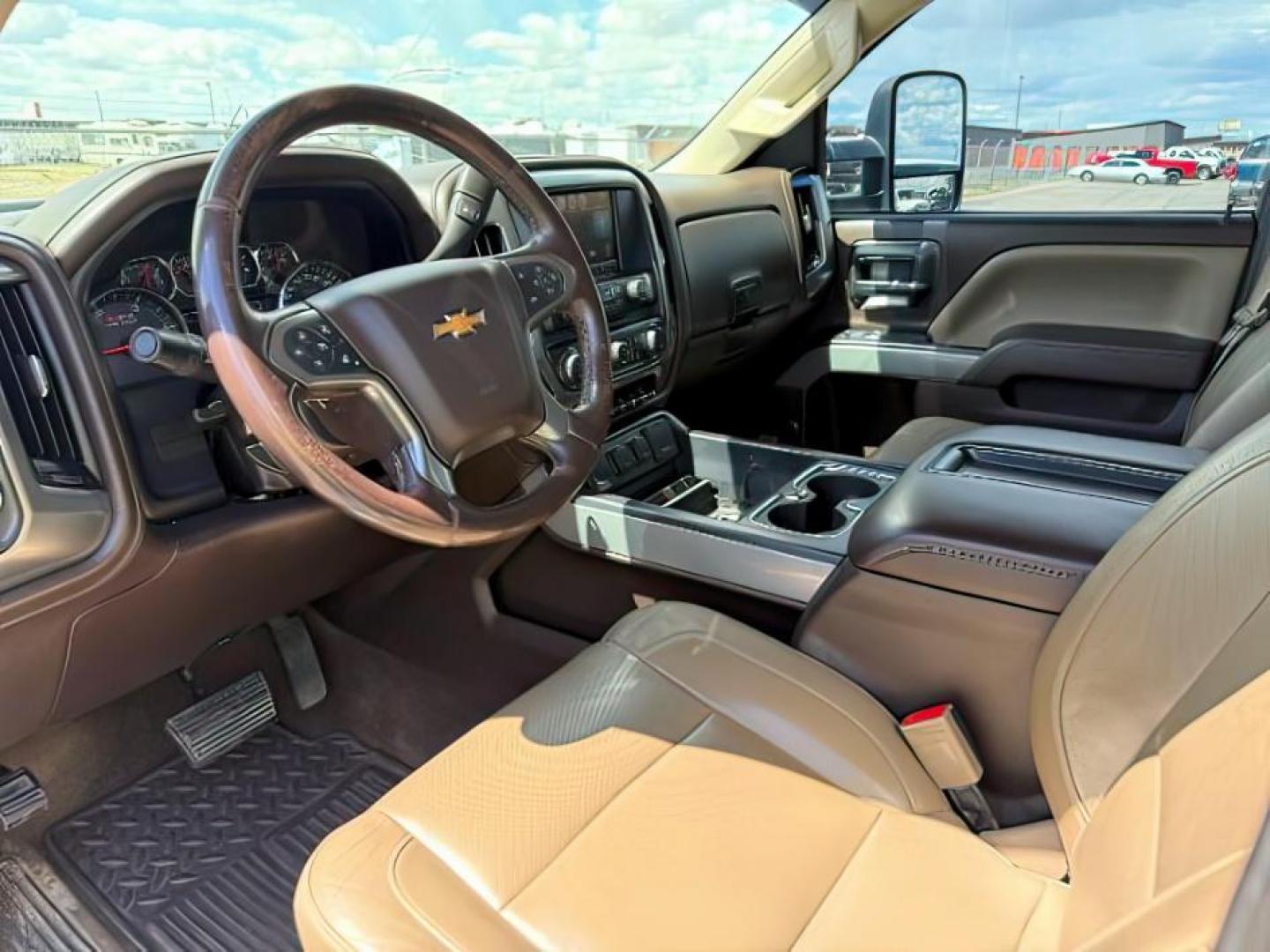 2015 Summit White /Cocoa/Dune Chevrolet Silverado 2500HD LTZ (1GC1KWE82FF) with an 6.6 engine, AUTOMATIC transmission, located at 1235 N Woodruff Ave., Idaho Falls, 83401, (208) 523-1053, 43.507172, -112.000488 - At Timberline Auto, finding a great deal on your next vehicle is always easy! Our experienced sales staff's goal is to help find you the right vehicle at the right price! Our knowledgeable finance department has options for almost any credit score. We offer extended service contract options to prote - Photo#8