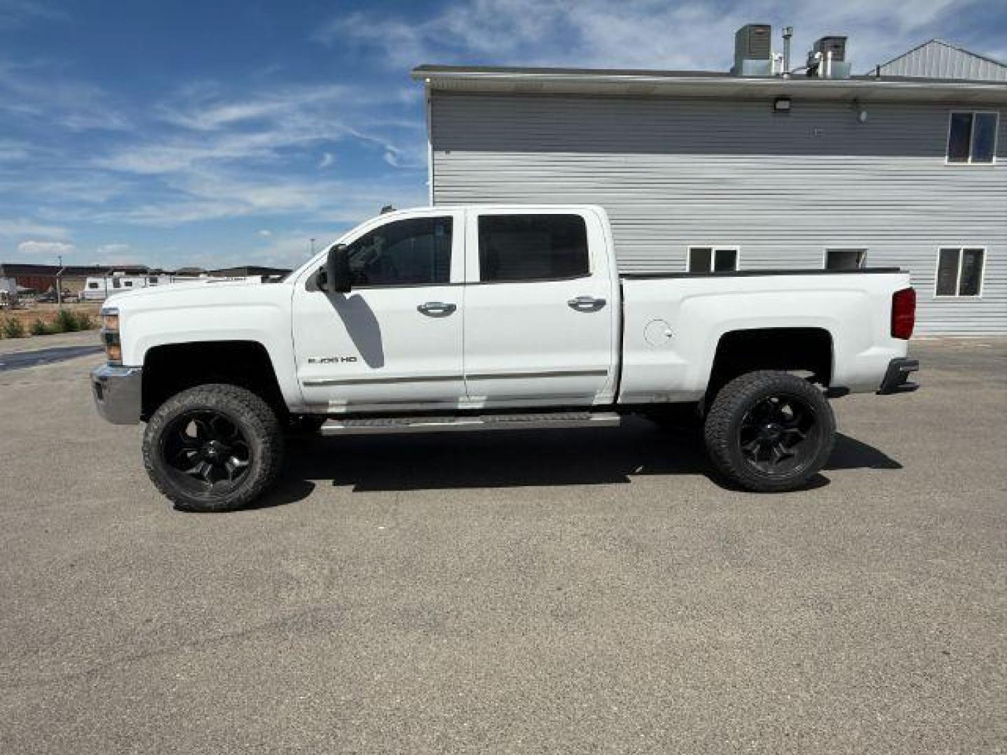 2015 Summit White /Cocoa/Dune Chevrolet Silverado 2500HD (1GC1KWE82FF) with an 66 engine, Automatic transmission, located at 1175 N Woodruff Ave, Idaho Falls, ID, 83401, 43.506901, -111.999657 - At Timberline Auto, finding a great deal on your next vehicle is always easy! Our experienced sales staff's goal is to help find you the right vehicle at the right price! Our knowledgeable finance department has options for almost any credit score. We offer extended service contract options to prote - Photo#19