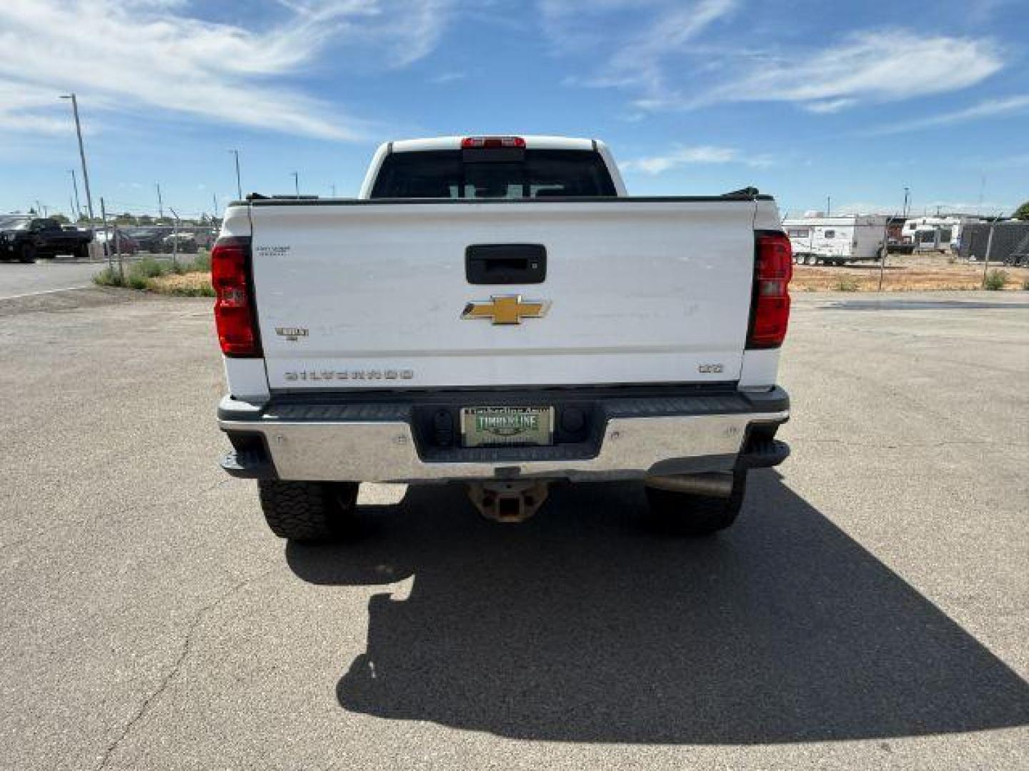 2015 Summit White /Cocoa/Dune Chevrolet Silverado 2500HD (1GC1KWE82FF) with an 66 engine, Automatic transmission, located at 1175 N Woodruff Ave, Idaho Falls, ID, 83401, 43.506901, -111.999657 - At Timberline Auto, finding a great deal on your next vehicle is always easy! Our experienced sales staff's goal is to help find you the right vehicle at the right price! Our knowledgeable finance department has options for almost any credit score. We offer extended service contract options to prote - Photo#21