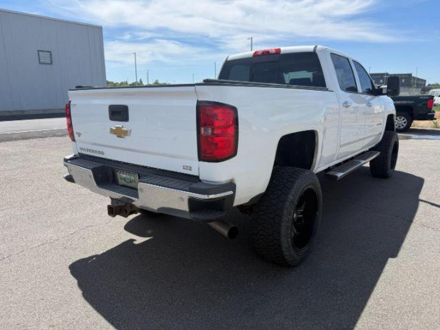 2015 Summit White /Cocoa/Dune Chevrolet Silverado 2500HD (1GC1KWE82FF) with an 66 engine, Automatic transmission, located at 1175 N Woodruff Ave, Idaho Falls, ID, 83401, 43.506901, -111.999657 - At Timberline Auto, finding a great deal on your next vehicle is always easy! Our experienced sales staff's goal is to help find you the right vehicle at the right price! Our knowledgeable finance department has options for almost any credit score. We offer extended service contract options to prote - Photo#23