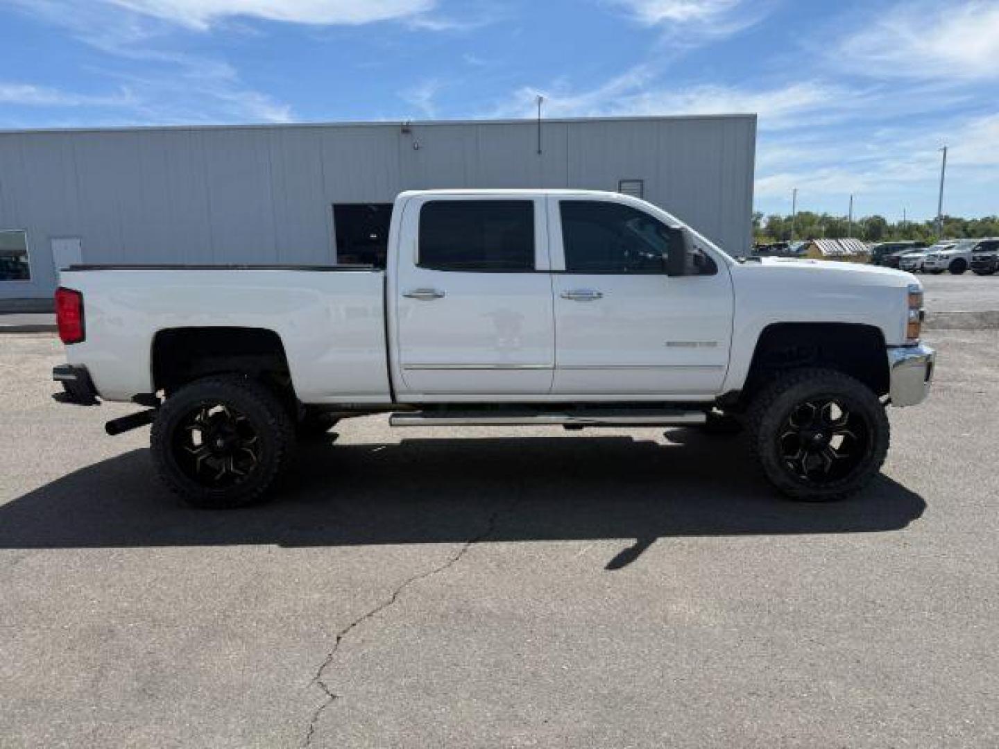 2015 Summit White /Cocoa/Dune Chevrolet Silverado 2500HD (1GC1KWE82FF) with an 66 engine, Automatic transmission, located at 1175 N Woodruff Ave, Idaho Falls, ID, 83401, 43.506901, -111.999657 - At Timberline Auto, finding a great deal on your next vehicle is always easy! Our experienced sales staff's goal is to help find you the right vehicle at the right price! Our knowledgeable finance department has options for almost any credit score. We offer extended service contract options to prote - Photo#24
