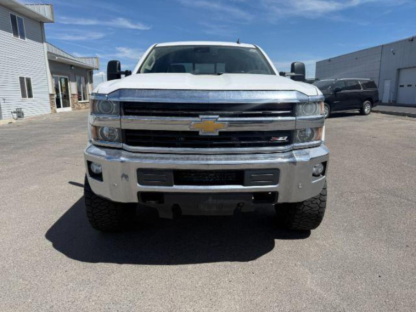 2015 Summit White /Cocoa/Dune Chevrolet Silverado 2500HD (1GC1KWE82FF) with an 66 engine, Automatic transmission, located at 1175 N Woodruff Ave, Idaho Falls, ID, 83401, 43.506901, -111.999657 - At Timberline Auto, finding a great deal on your next vehicle is always easy! Our experienced sales staff's goal is to help find you the right vehicle at the right price! Our knowledgeable finance department has options for almost any credit score. We offer extended service contract options to prote - Photo#26