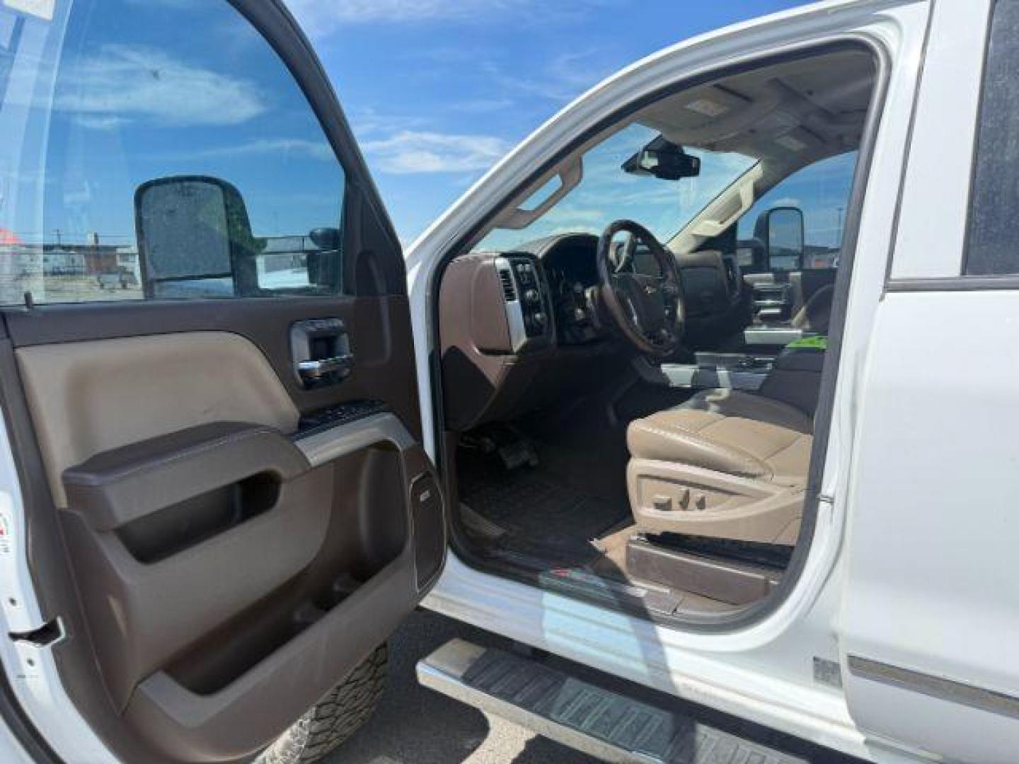 2015 Summit White /Cocoa/Dune Chevrolet Silverado 2500HD (1GC1KWE82FF) with an 66 engine, Automatic transmission, located at 1175 N Woodruff Ave, Idaho Falls, ID, 83401, 43.506901, -111.999657 - At Timberline Auto, finding a great deal on your next vehicle is always easy! Our experienced sales staff's goal is to help find you the right vehicle at the right price! Our knowledgeable finance department has options for almost any credit score. We offer extended service contract options to prote - Photo#29