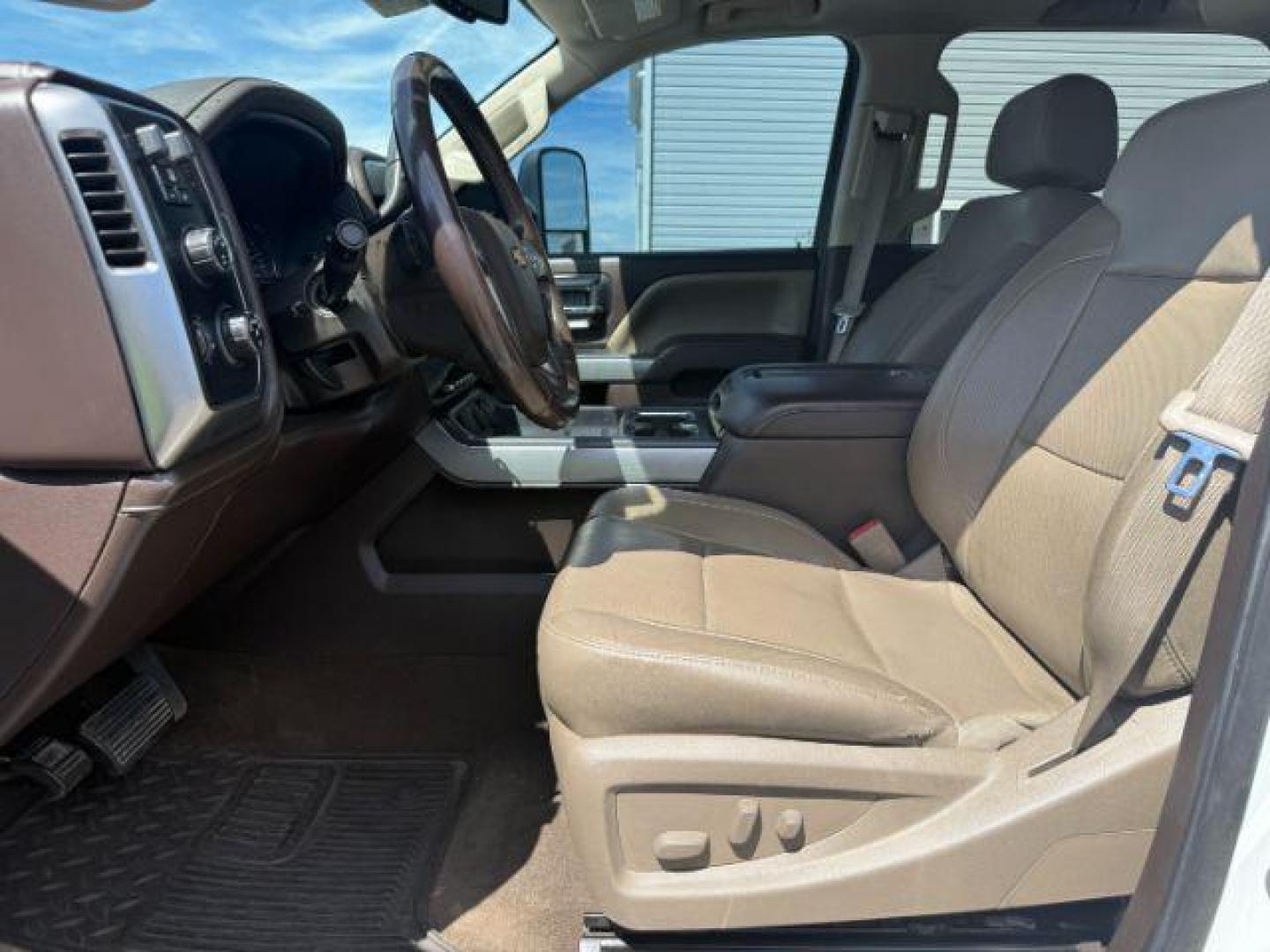 2015 Summit White /Cocoa/Dune Chevrolet Silverado 2500HD (1GC1KWE82FF) with an 66 engine, Automatic transmission, located at 1175 N Woodruff Ave, Idaho Falls, ID, 83401, 43.506901, -111.999657 - At Timberline Auto, finding a great deal on your next vehicle is always easy! Our experienced sales staff's goal is to help find you the right vehicle at the right price! Our knowledgeable finance department has options for almost any credit score. We offer extended service contract options to prote - Photo#30