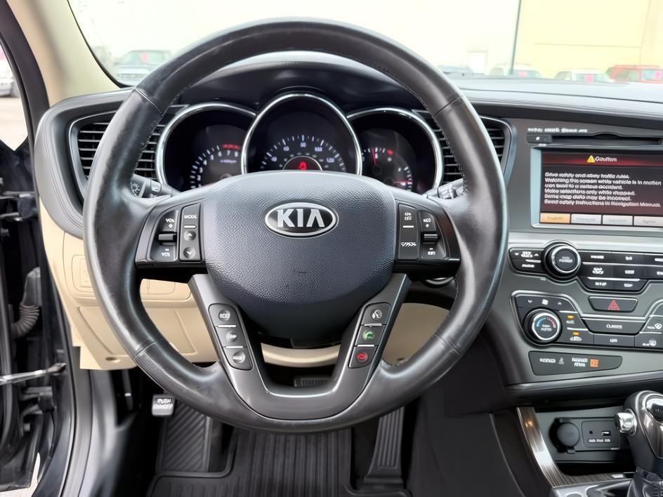 2013 BLACK /Gray KIA Optima (5XXGN4A73DG) with an 24L I-4 gasoline direct injection engine, Automatic transmission, located at 1175 N Woodruff Ave, Idaho Falls, ID, 83401, 43.506901, -111.999657 - At Timberline Auto, finding a great deal on your next vehicle is always easy! Our experienced sales staff goal is to help find you the right vehicle at the right price! Our knowledgeable finance department has options for almost any credit score. We offer extended service contract options to prot- Photo#12