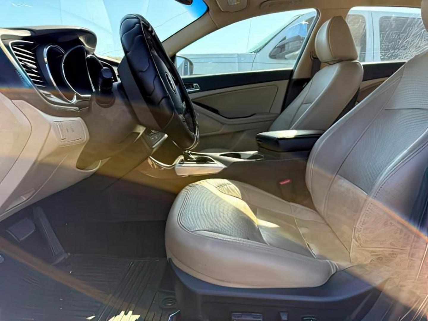 2013 BLACK /Beige KIA Optima (5XXGN4A73DG) with an 24L I-4 gasoline direct injection engine, Automatic transmission, located at 1175 N Woodruff Ave, Idaho Falls, ID, 83401, 43.506901, -111.999657 - At Timberline Auto, finding a great deal on your next vehicle is always easy! Our experienced sales staff's goal is to help find you the right vehicle at the right price! Our knowledgeable finance department has options for almost any credit score. We offer extended service contract options to prote - Photo#8