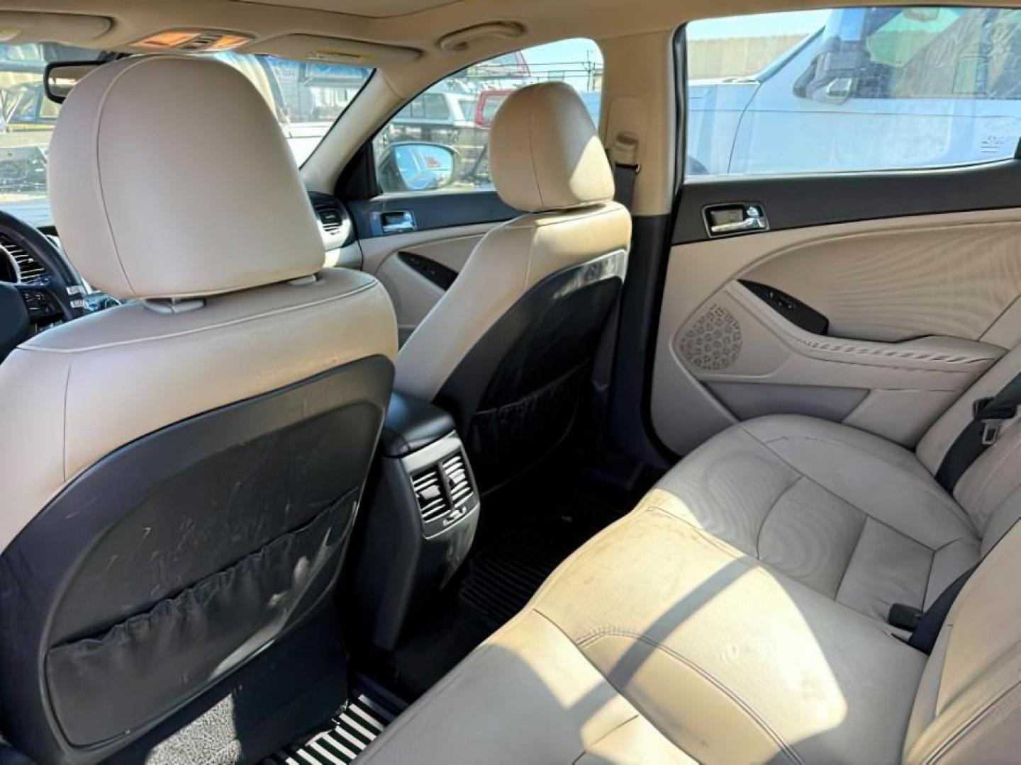 2013 BLACK /Beige KIA Optima (5XXGN4A73DG) with an 24L I-4 gasoline direct injection engine, Automatic transmission, located at 1175 N Woodruff Ave, Idaho Falls, ID, 83401, 43.506901, -111.999657 - At Timberline Auto, finding a great deal on your next vehicle is always easy! Our experienced sales staff's goal is to help find you the right vehicle at the right price! Our knowledgeable finance department has options for almost any credit score. We offer extended service contract options to prote - Photo#17