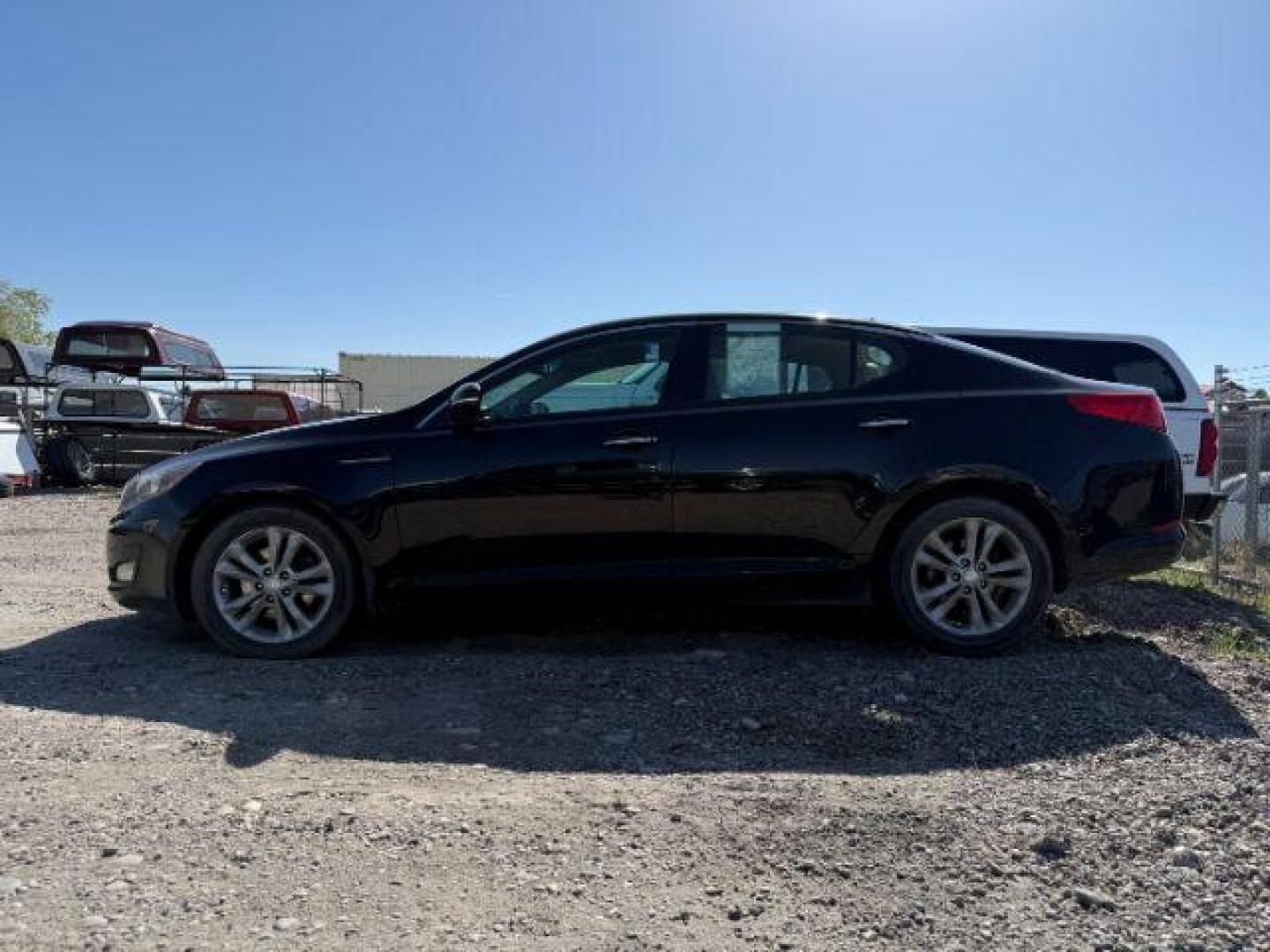 2013 BLACK /Beige Kia Optima EX (5XXGN4A73DG) with an 2.4L I-4 gasoline direct injection engine, AUTOMATIC transmission, located at 1235 N Woodruff Ave., Idaho Falls, 83401, (208) 523-1053, 43.507172, -112.000488 - At Timberline Auto, finding a great deal on your next vehicle is always easy! Our experienced sales staff's goal is to help find you the right vehicle at the right price! Our knowledgeable finance department has options for almost any credit score. We offer extended service contract options to prote - Photo#1