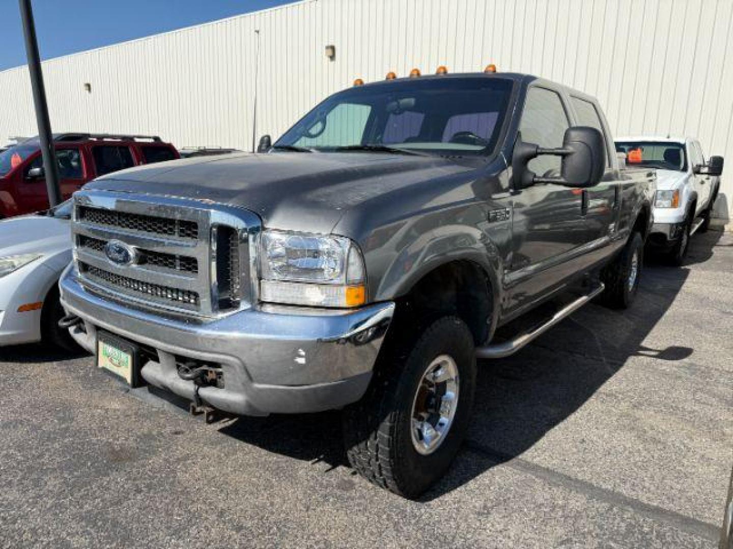 2000 GRAY /LEATHER Ford F-350 LARIAT (3FTSW31F7YM) with an 7.3L POWER STROKE engine, AUTOMATIC transmission, located at 1235 N Woodruff Ave., Idaho Falls, 83401, (208) 523-1053, 43.507172, -112.000488 - Photo#0