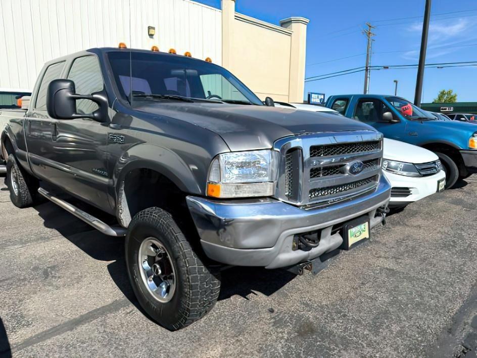 2000 GRAY /LEATHER Ford F-350 (3FTSW31F7YM) with an 73L POWER STROKE engine, Automatic transmission, located at 1175 N Woodruff Ave, Idaho Falls, ID, 83401, 43.506901, -111.999657 - This 2000 Ford F-350 Super Duty is a heavy-duty pickup built for demanding workloads and year-round capability. Powered by a 7.3L Power Stroke diesel, it delivers the strong low-end torque and towing performance these trucks are known for. Built on the Super Duty platform, it is designed to handle t- Photo#3