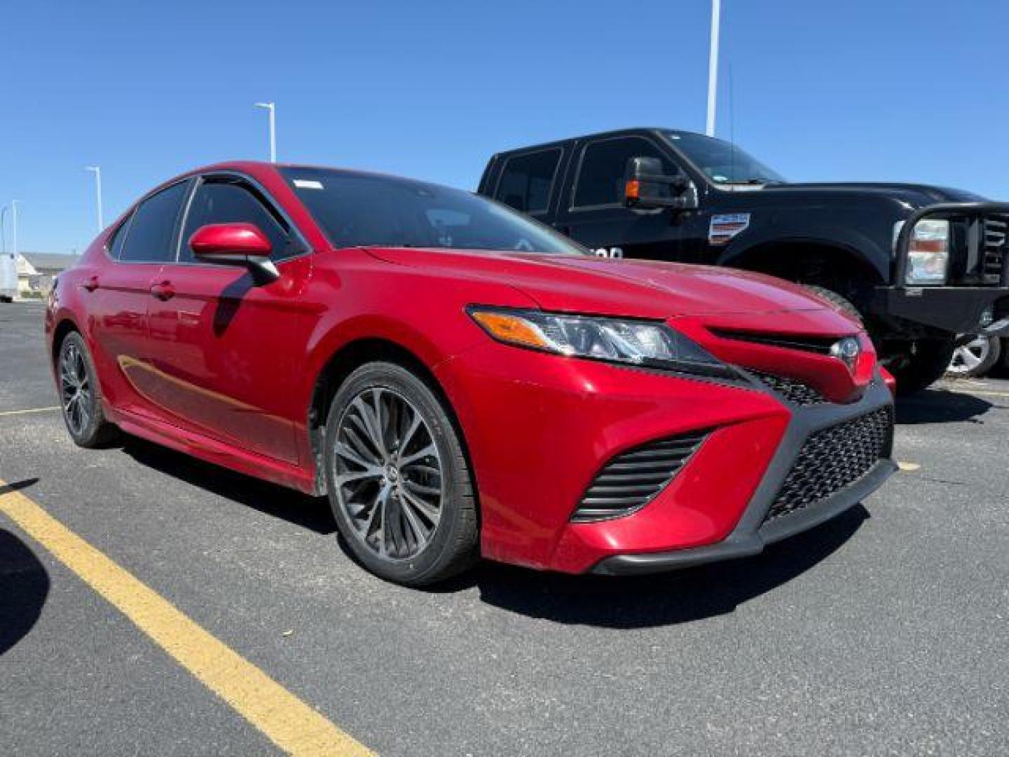 2019 Supersonic Red /Black, leatherette/cloth Toyota Camry SE (4T1B11HK9KU) with an 2.5L L4 DOHC 16V engine, 8-Speed Automatic transmission, located at 1235 N Woodruff Ave., Idaho Falls, 83401, (208) 523-1053, 43.507172, -112.000488 - At Timberline Auto, finding a great deal on your next vehicle is always easy! Our experienced sales staff's goal is to help find you the right vehicle at the right price! Our knowledgeable finance department has options for almost any credit score. We offer extended service contract options to prote - Photo#0