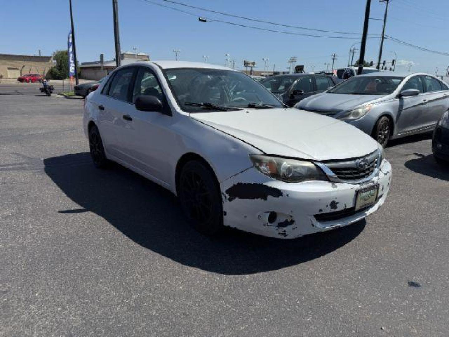 2008 Satin White Pearl /Off Black Subaru Impreza 2.5i (JF1GE61638H) with an 2.5L H-4 variable valve control engine, AUTOMATIC transmission, located at 1235 N Woodruff Ave., Idaho Falls, 83401, (208) 523-1053, 43.507172, -112.000488 - At Timberline Auto, finding a great deal on your next vehicle is always easy! Our experienced sales staff's goal is to help find you the right vehicle at the right price! Our knowledgeable finance department has options for almost any credit score. We offer extended service contract options to prote - Photo#23