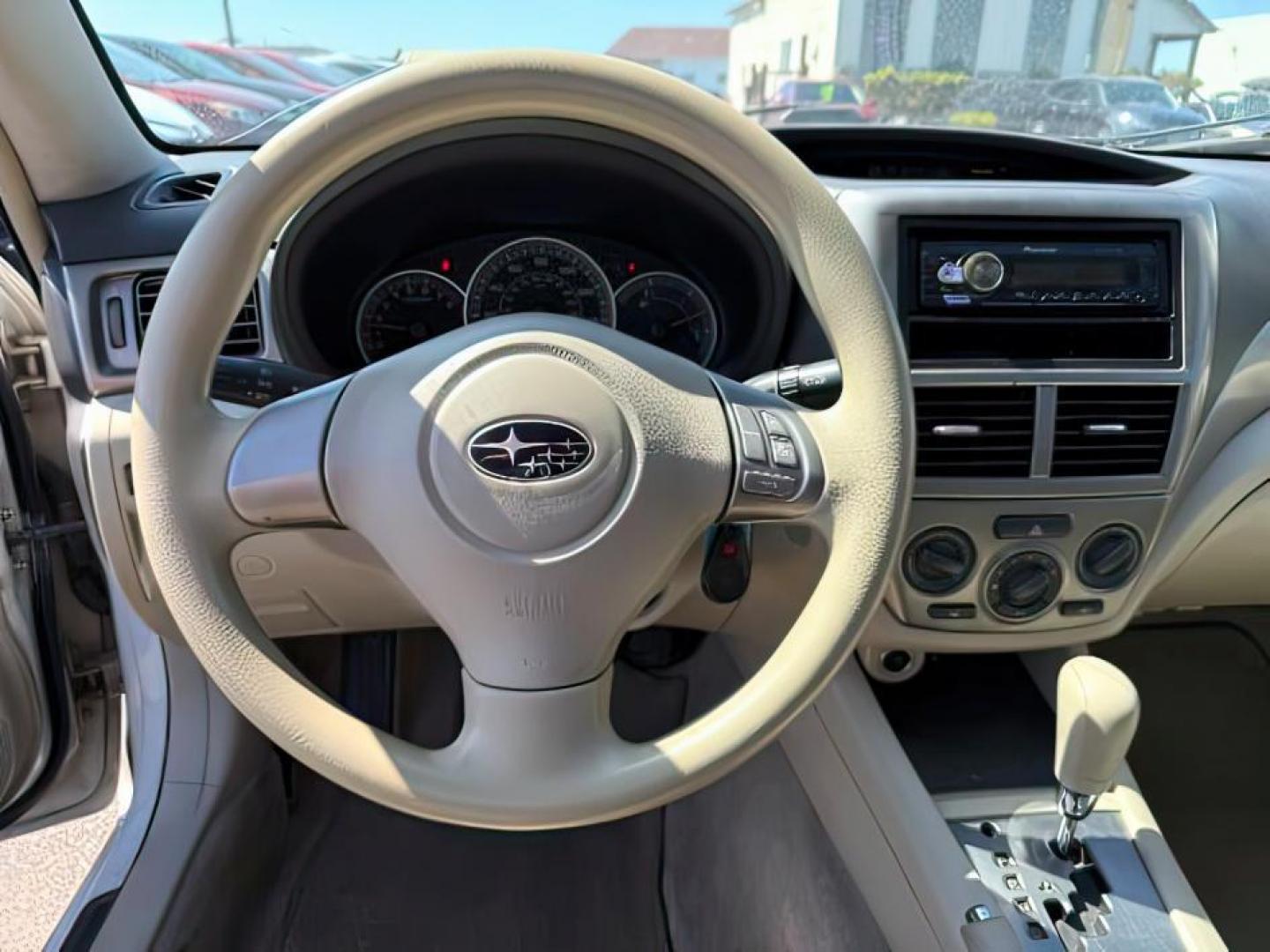 2008 Satin White Pearl /Off Black Subaru Impreza 2.5i (JF1GE61638H) with an 2.5L H-4 variable valve control engine, AUTOMATIC transmission, located at 1235 N Woodruff Ave., Idaho Falls, 83401, (208) 523-1053, 43.507172, -112.000488 - At Timberline Auto, finding a great deal on your next vehicle is always easy! Our experienced sales staff's goal is to help find you the right vehicle at the right price! Our knowledgeable finance department has options for almost any credit score. We offer extended service contract options to prote - Photo#10
