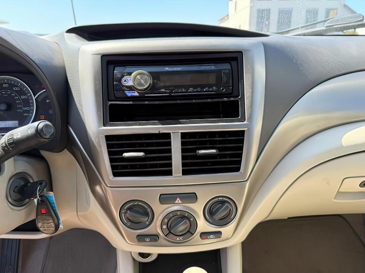 2008 Satin White Pearl /Off Black Subaru Impreza 2.5i (JF1GE61638H) with an 2.5L H-4 variable valve control engine, AUTOMATIC transmission, located at 1235 N Woodruff Ave., Idaho Falls, 83401, (208) 523-1053, 43.507172, -112.000488 - At Timberline Auto, finding a great deal on your next vehicle is always easy! Our experienced sales staff's goal is to help find you the right vehicle at the right price! Our knowledgeable finance department has options for almost any credit score. We offer extended service contract options to prote - Photo#11