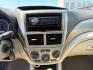2008 Satin White Pearl /Off Black Subaru Impreza 2.5i (JF1GE61638H) with an 2.5L H-4 variable valve control engine, AUTOMATIC transmission, located at 1235 N Woodruff Ave., Idaho Falls, 83401, (208) 523-1053, 43.507172, -112.000488 - At Timberline Auto, finding a great deal on your next vehicle is always easy! Our experienced sales staff's goal is to help find you the right vehicle at the right price! Our knowledgeable finance department has options for almost any credit score. We offer extended service contract options to prote - Photo#11