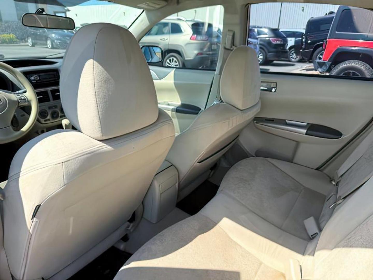 2008 Satin White Pearl /Off Black Subaru Impreza 2.5i (JF1GE61638H) with an 2.5L H-4 variable valve control engine, AUTOMATIC transmission, located at 1235 N Woodruff Ave., Idaho Falls, 83401, (208) 523-1053, 43.507172, -112.000488 - At Timberline Auto, finding a great deal on your next vehicle is always easy! Our experienced sales staff's goal is to help find you the right vehicle at the right price! Our knowledgeable finance department has options for almost any credit score. We offer extended service contract options to prote - Photo#15