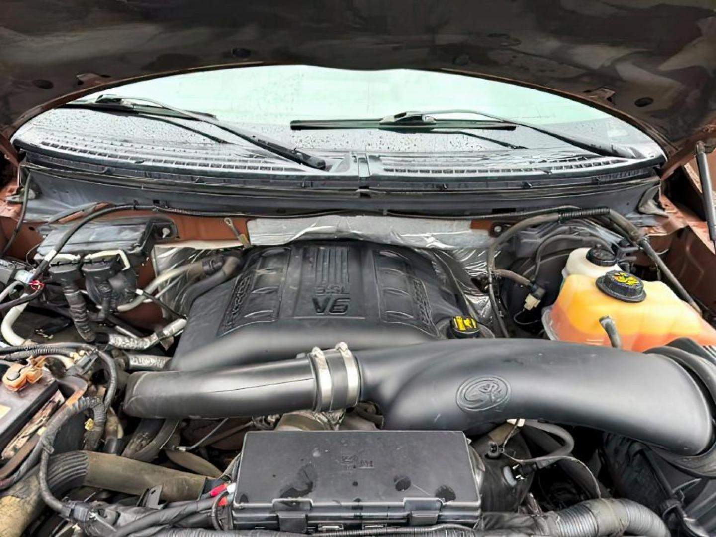 2012 Golden Bronze Metallic /Sienna Ford F-150 (1FTFW1ET2CF) with an EcoBoost 35L V-6 gasoline direct injection engine, Automatic transmission, located at 1175 N Woodruff Ave, Idaho Falls, ID, 83401, 43.506901, -111.999657 - At Timberline Auto, finding a great deal on your next vehicle is always easy! Our experienced sales staff's goal is to help find you the right vehicle at the right price! Our knowledgeable finance department has options for almost any credit score. We offer extended service contract options to prote - Photo#23