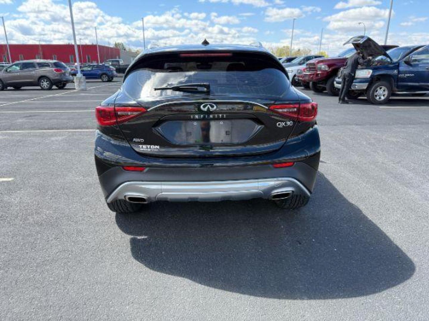 2019 Black Obsidian /Graphite INFINITI QX30 LUXE (SJKCH5CR7KA) with an 2L I-4 gasoline direct injection engine, AUTOMATIC transmission, located at 1235 N Woodruff Ave., Idaho Falls, 83401, (208) 523-1053, 43.507172, -112.000488 - At Timberline Auto, finding a great deal on your next vehicle is always easy! Our experienced sales staff's goal is to help find you the right vehicle at the right price! Our knowledgeable finance department has options for almost any credit score. We offer extended service contract options to prote - Photo#3