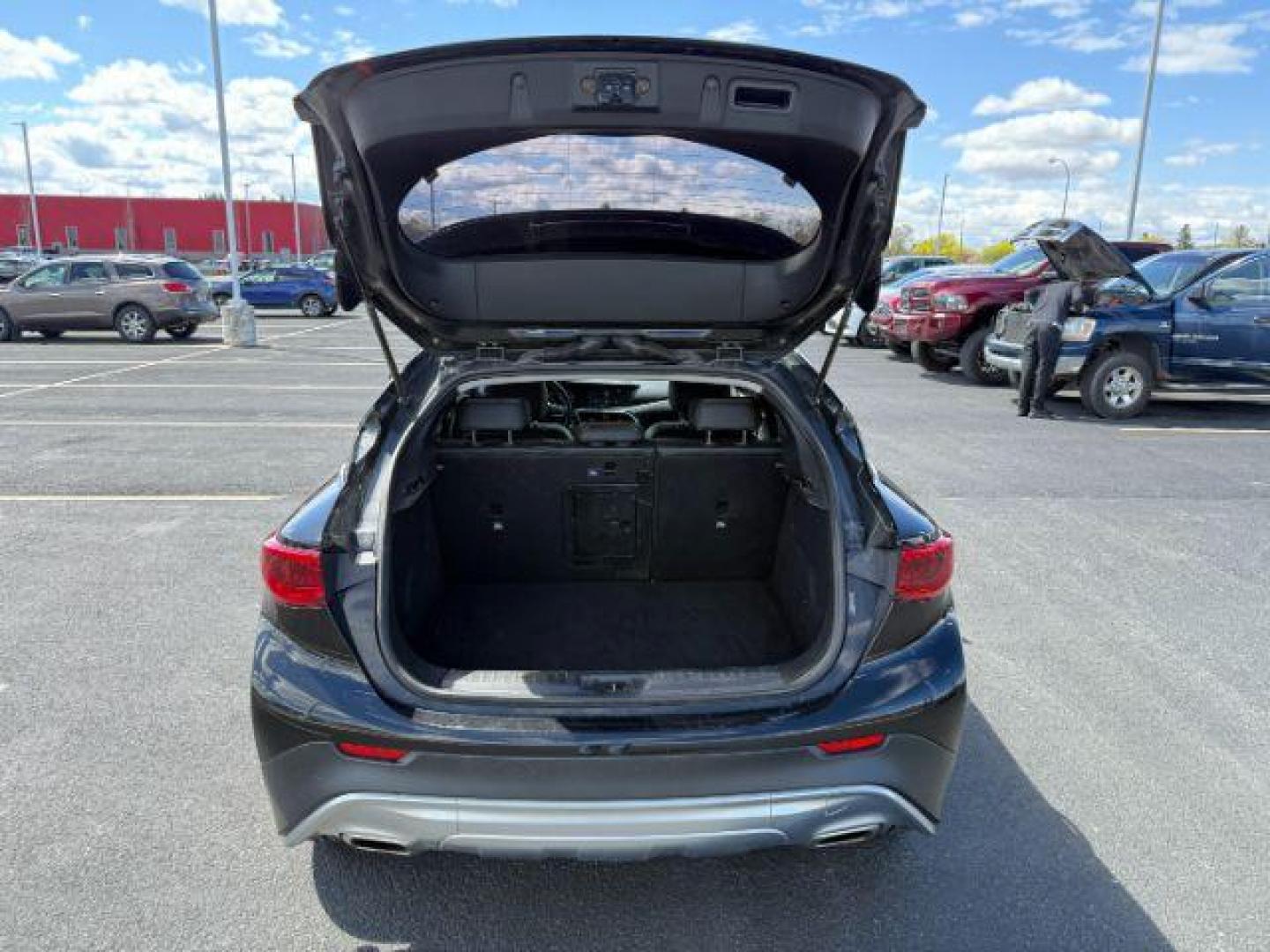 2019 Black Obsidian /Graphite INFINITI QX30 LUXE (SJKCH5CR7KA) with an 2L I-4 gasoline direct injection engine, AUTOMATIC transmission, located at 1235 N Woodruff Ave., Idaho Falls, 83401, (208) 523-1053, 43.507172, -112.000488 - At Timberline Auto, finding a great deal on your next vehicle is always easy! Our experienced sales staff's goal is to help find you the right vehicle at the right price! Our knowledgeable finance department has options for almost any credit score. We offer extended service contract options to prote - Photo#4