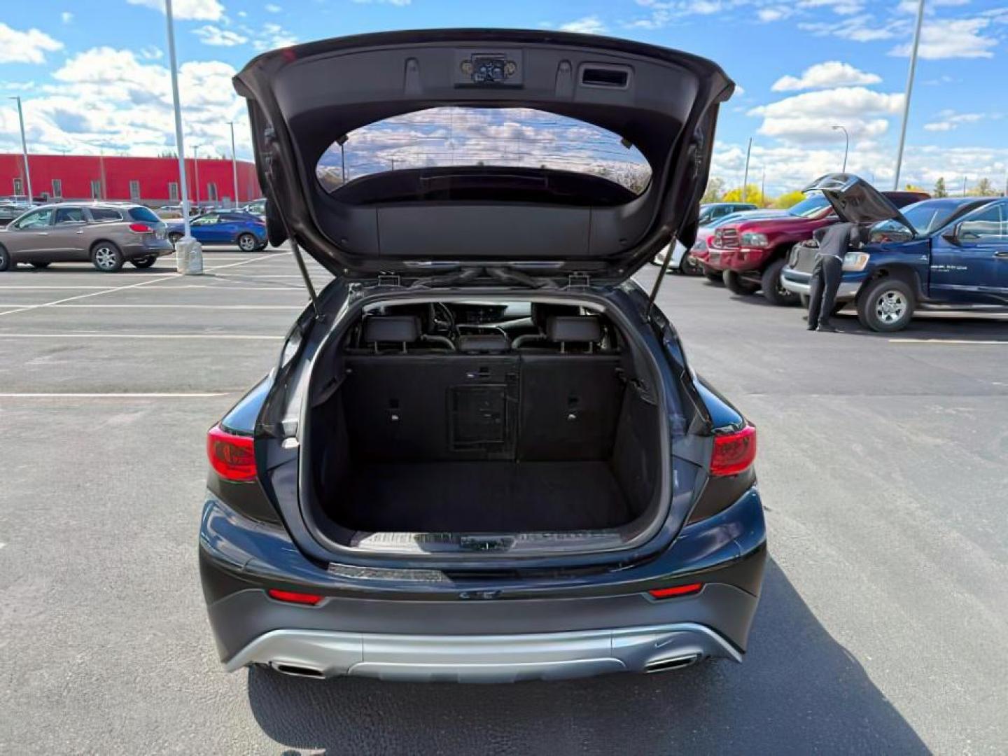 2019 Black Obsidian /Graphite Infiniti QX30 (SJKCH5CR7KA) with an 2L I-4 gasoline direct injection engine, Automatic transmission, located at 1175 N Woodruff Ave, Idaho Falls, ID, 83401, 43.506901, -111.999657 - At Timberline Auto, finding a great deal on your next vehicle is always easy! Our experienced sales staff's goal is to help find you the right vehicle at the right price! Our knowledgeable finance department has options for almost any credit score. We offer extended service contract options to prote - Photo#4
